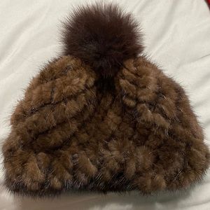 Beautiful soft real mink knit beanie with fur pom pom.